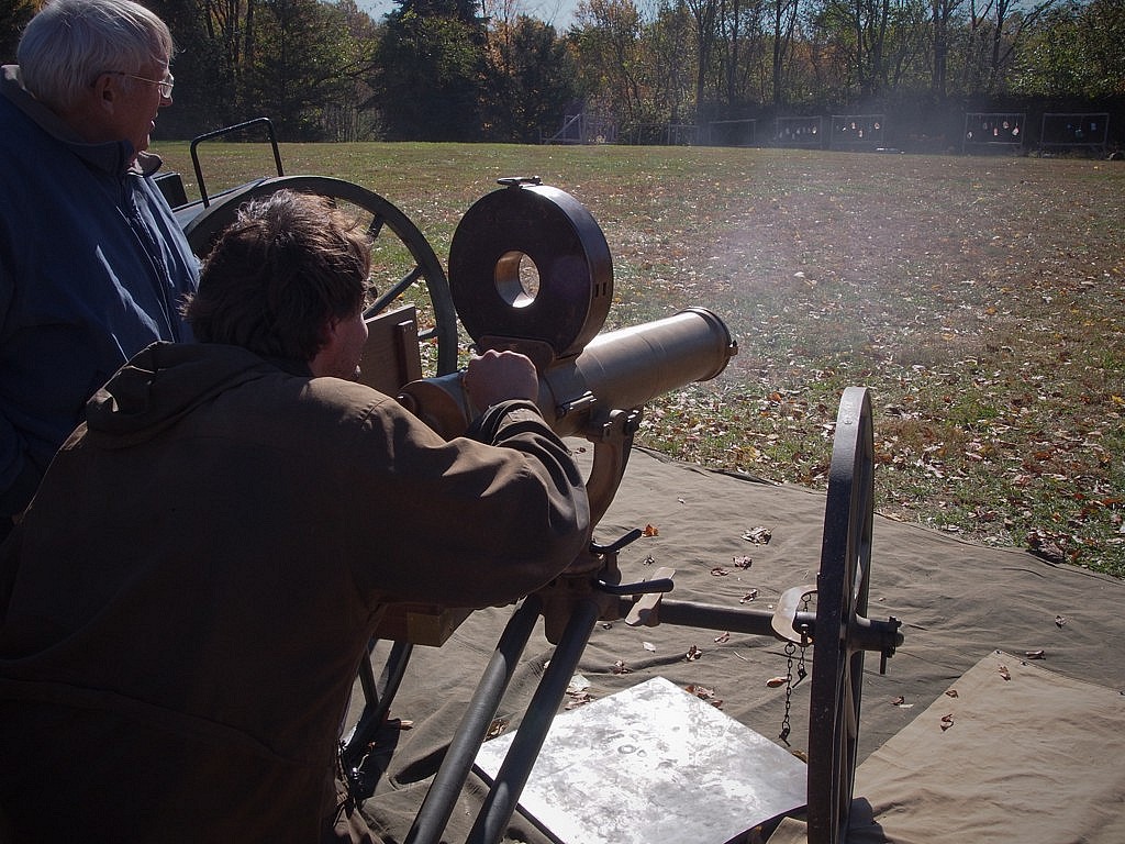 firing an 1884 Gatling gun