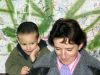 Mother and son at a bus stop by Jim Sabatke