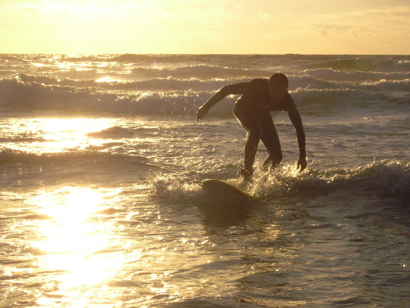 My friend on surfboard