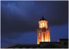 Manila City hall clock tower at night by Allan Barredo