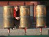 Monk and prayer wheels by Pekka Nihtinen