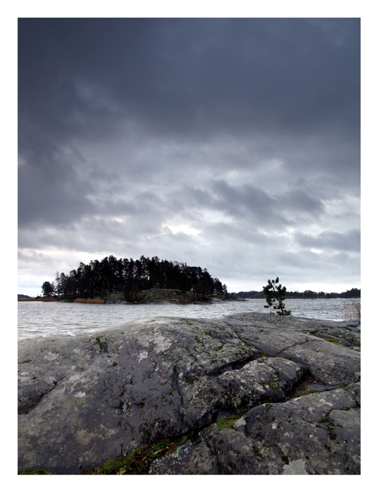 Rock, sea, sky.