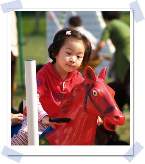 red girl on red house