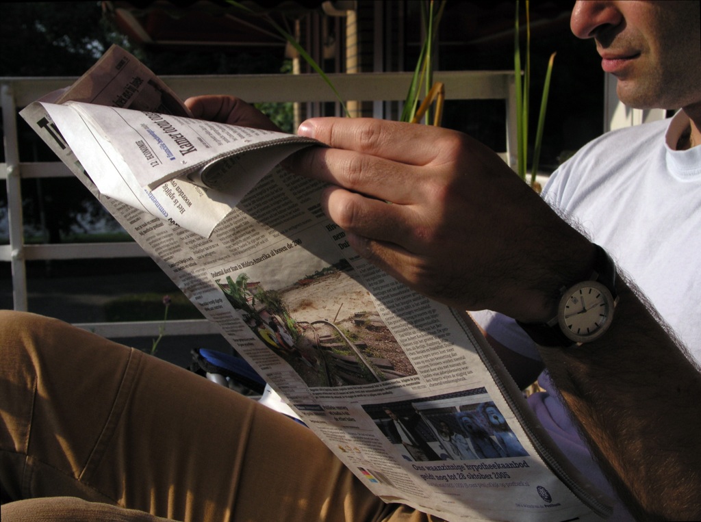 Peter reading newspaper 2
