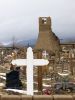 Crucifix and Church, Indian Pueblo, New Mexico by Rob Faucher