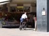 Summer In The City - cop with bike by Hans Gerlich