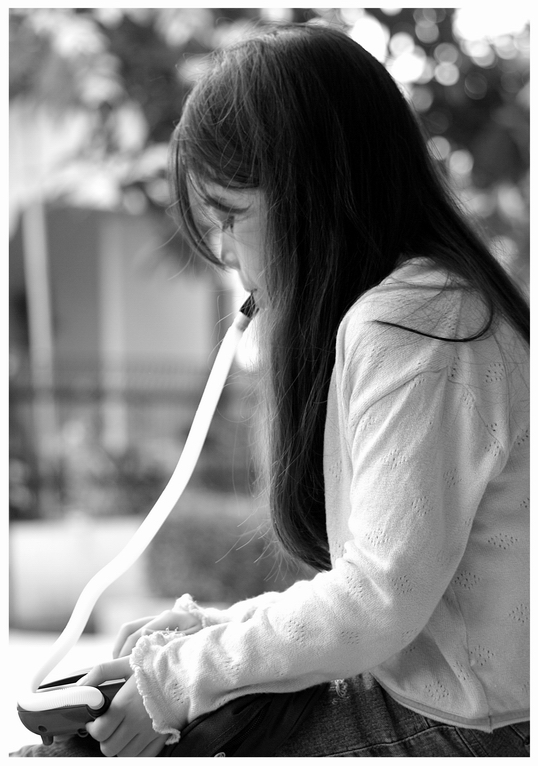 Little Girl and Her Pianica