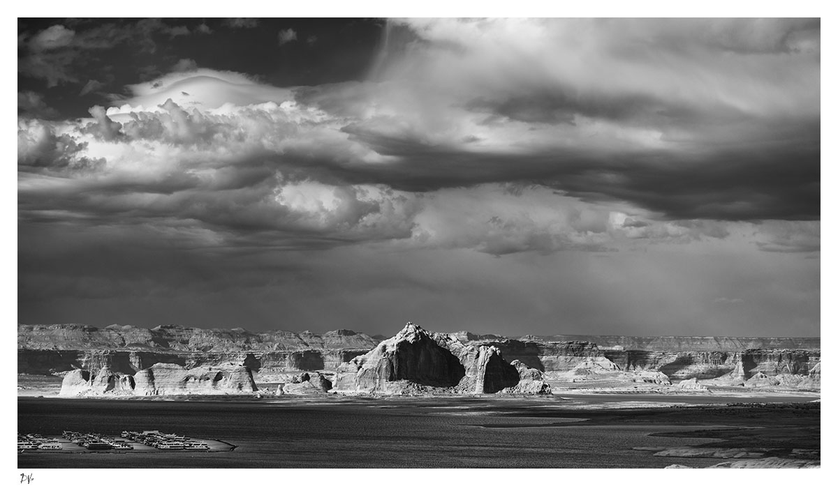 Calm lake, stormy skies
